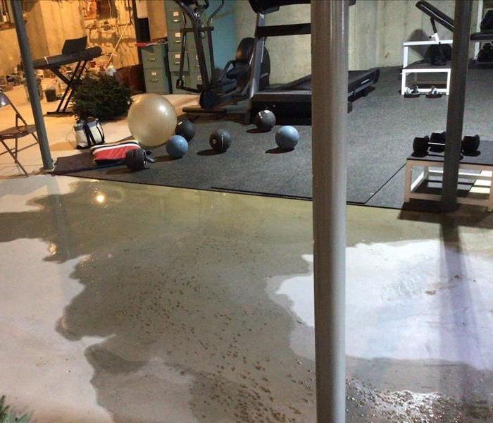 Home Gym with Water on Floor