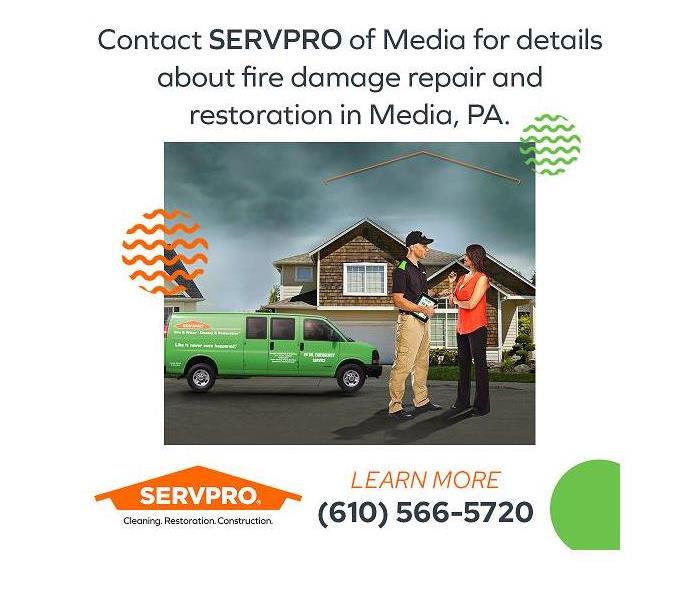SERVPRO technician with a client